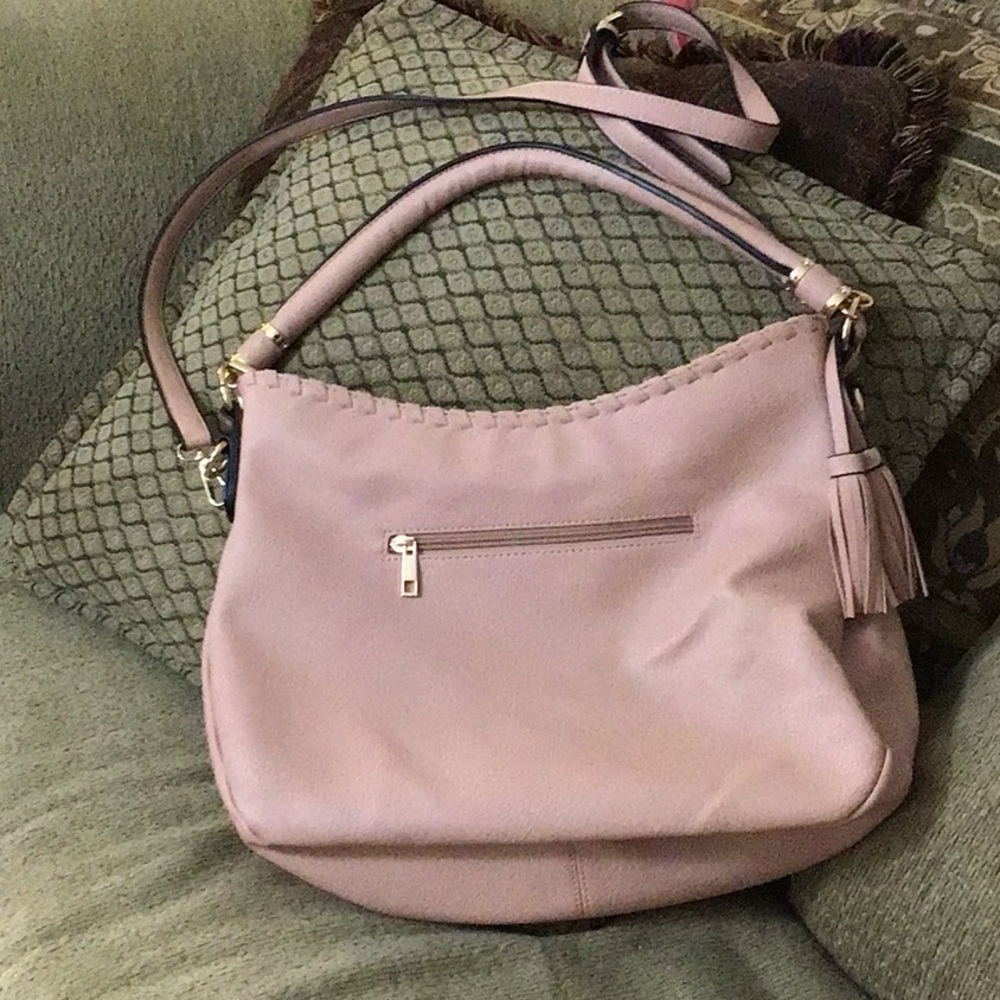 This is hobo bag purse pale pink 14” x 11” not including straps EUC faux leather
